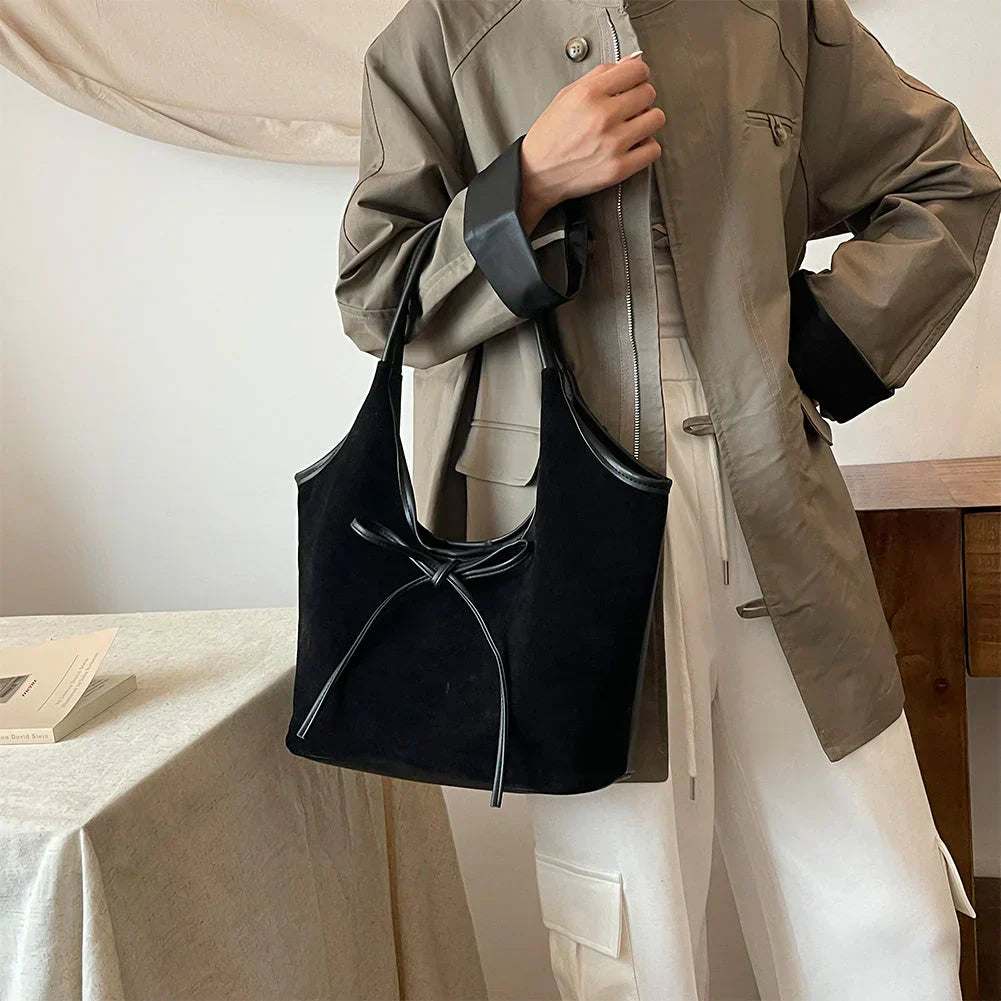 Carla™ | Borsa con fiocco