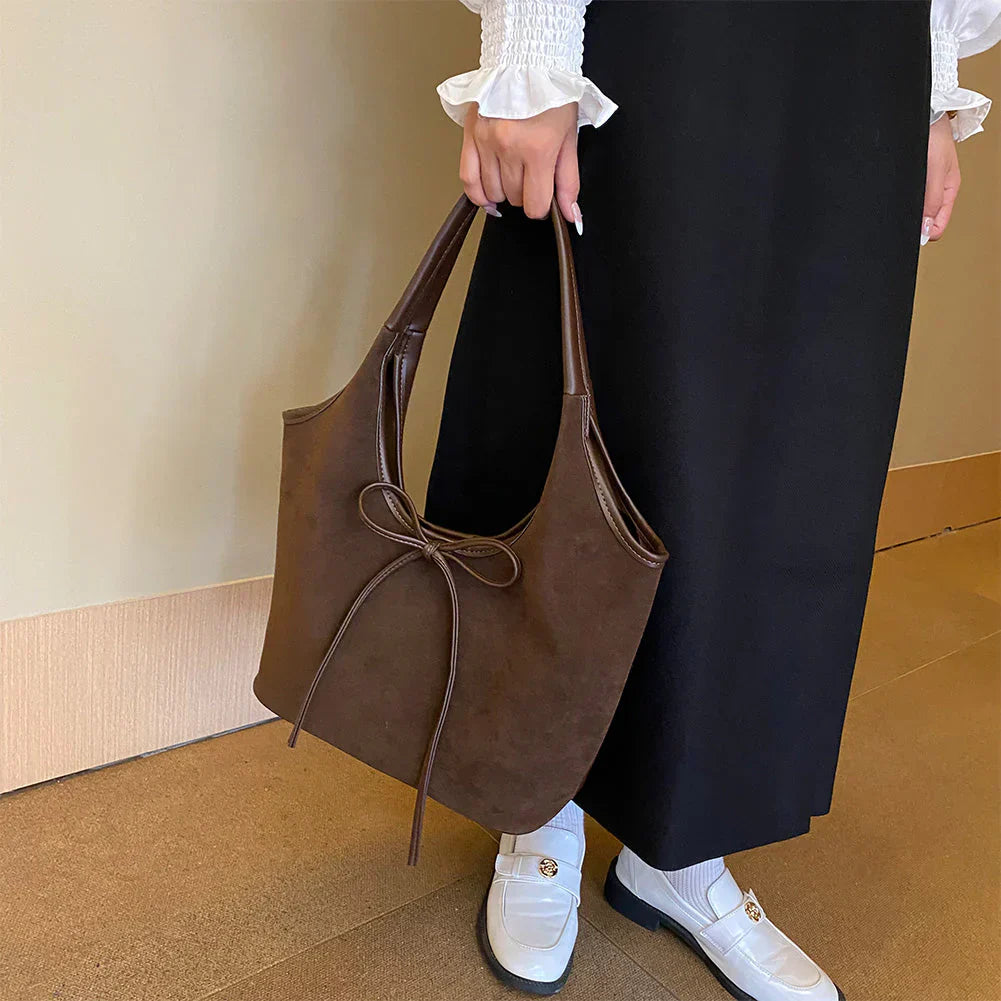 Carla™ | Borsa con fiocco