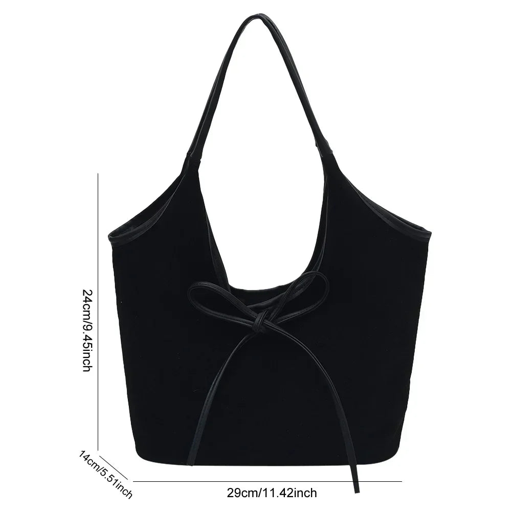 Carla™ | Borsa con fiocco