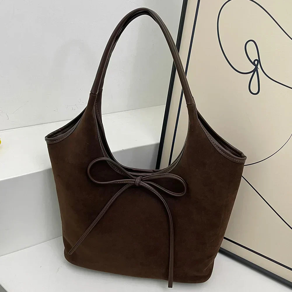 Carla™ | Borsa con fiocco