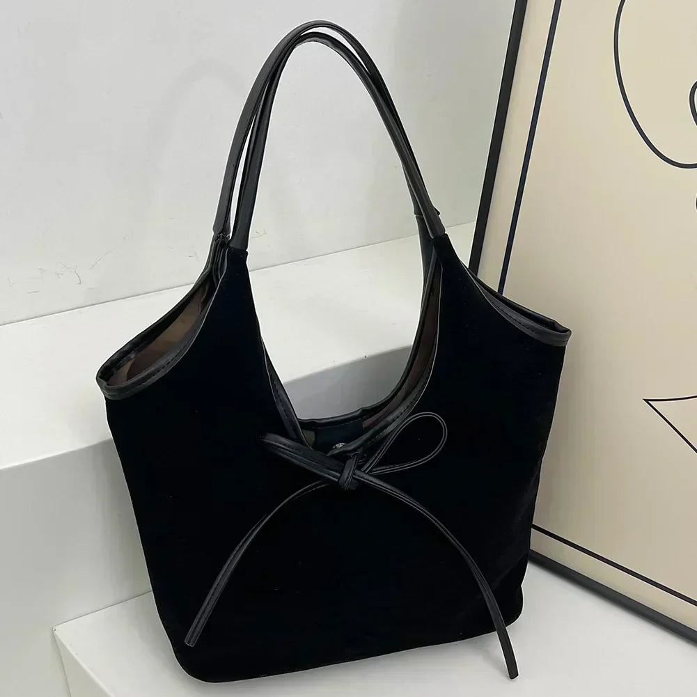 Carla™ | Borsa con fiocco