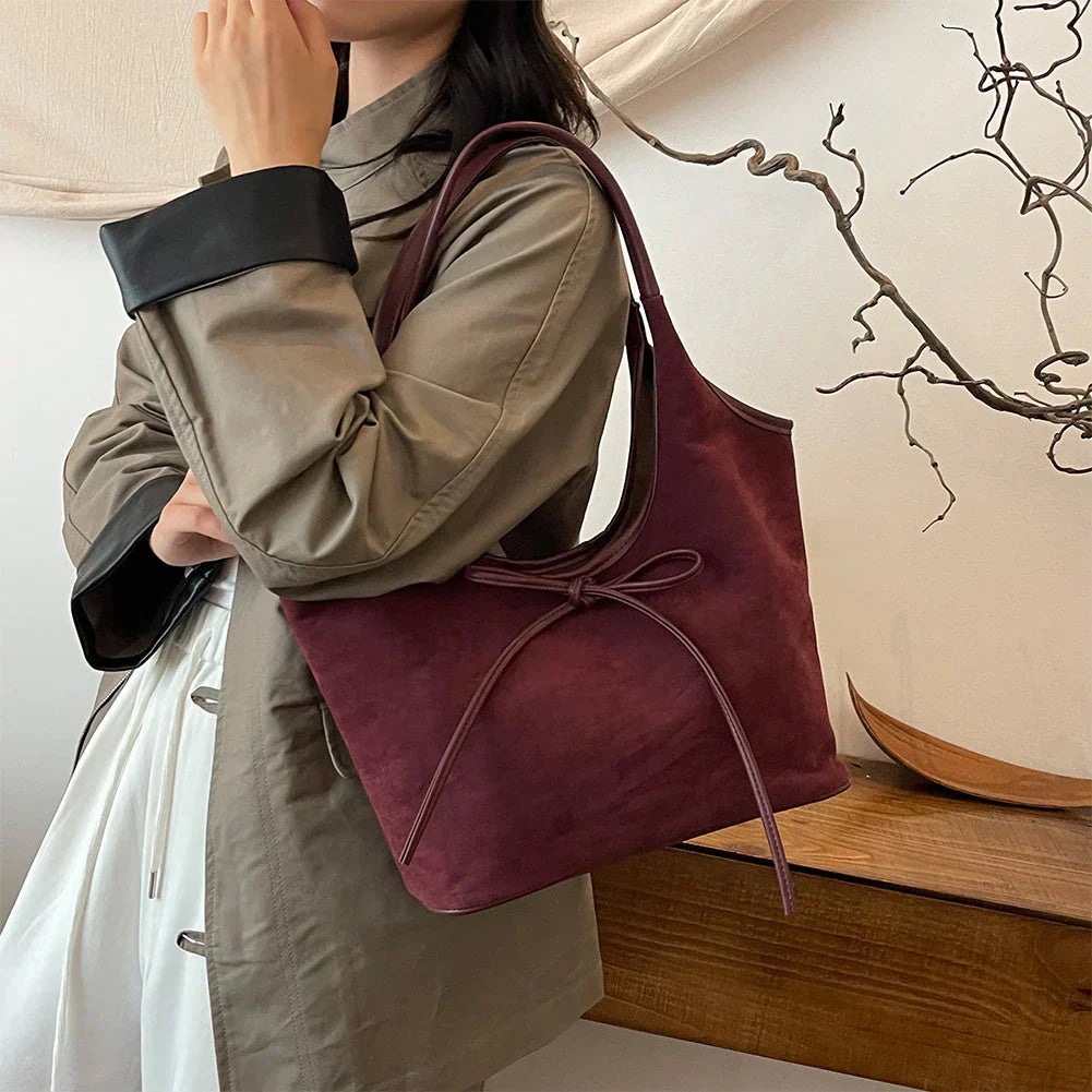 Carla™ | Borsa con fiocco