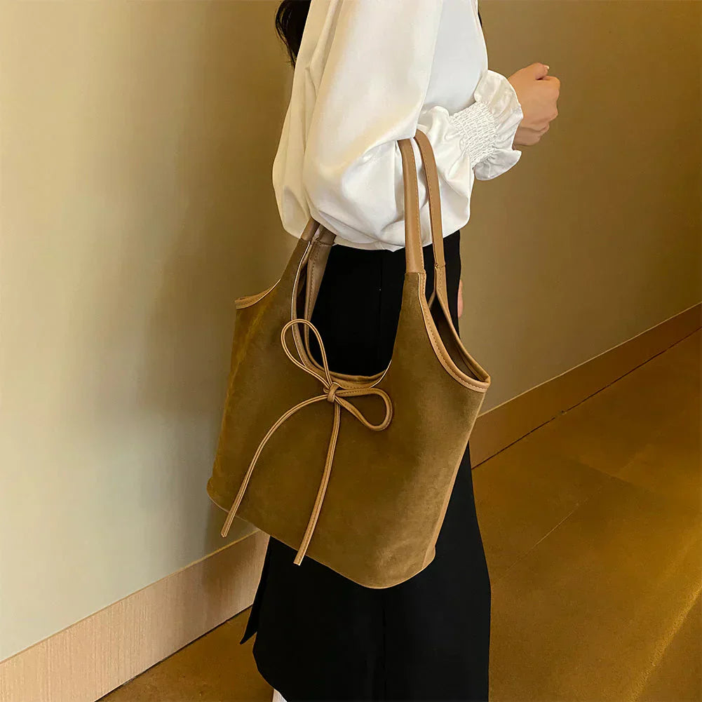 Carla™ | Borsa con fiocco