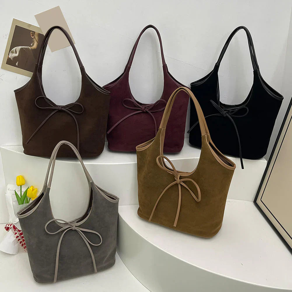 Carla™ | Borsa con fiocco